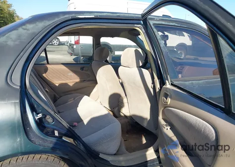 1999 Toyota Corolla Ce из США, поврежденный, VIN 2T1BR12E4XC238429